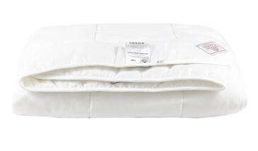 Наматрасник стеганый, с резинками по углам Merino Wool. Легкий German Grass